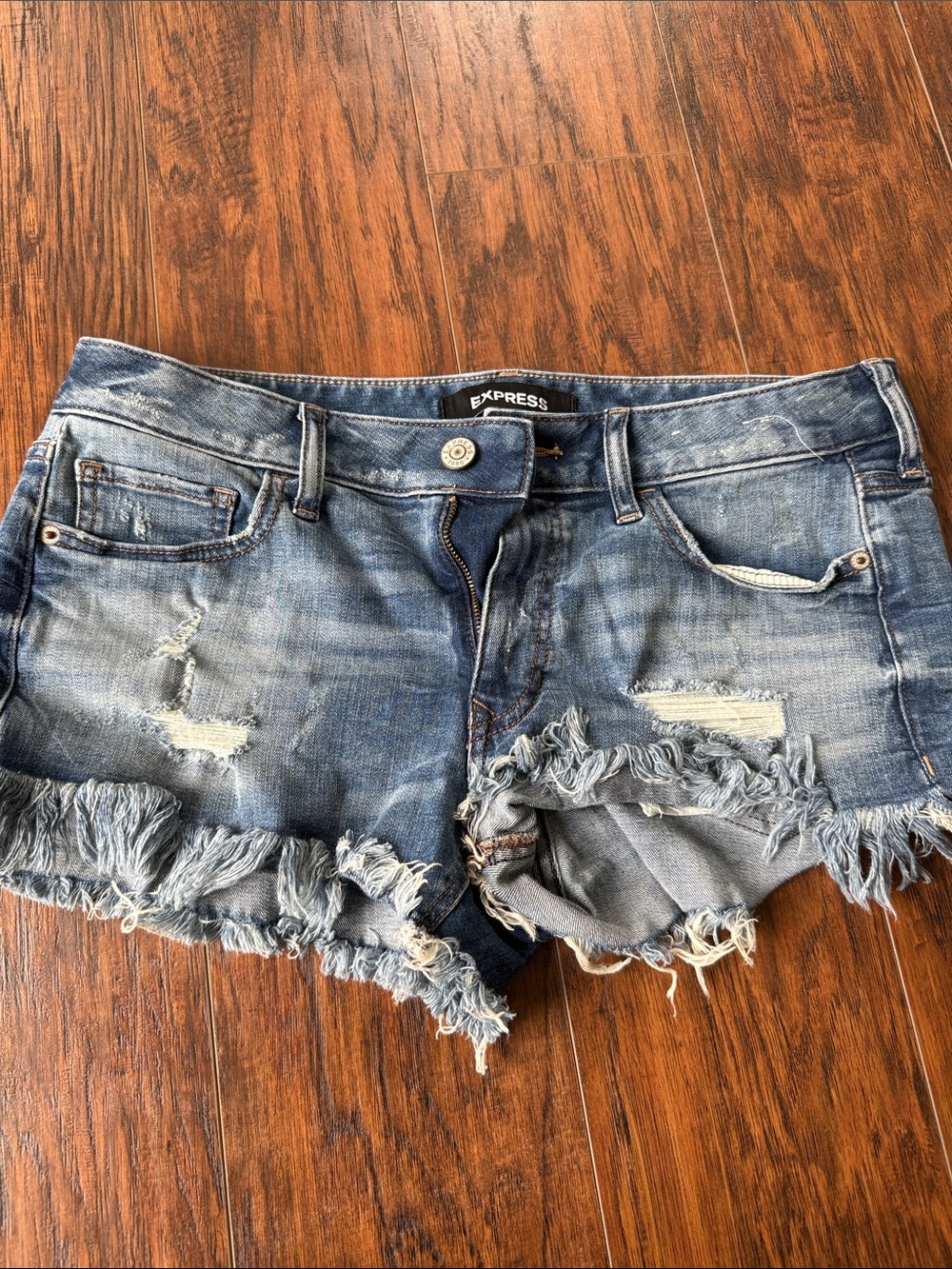 Express Frayed Hem Distressed Jean Shorts in Faded Blue